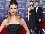 Behati Prinsloo dazzles in strapless pinstriped gown while Adam Levine ...