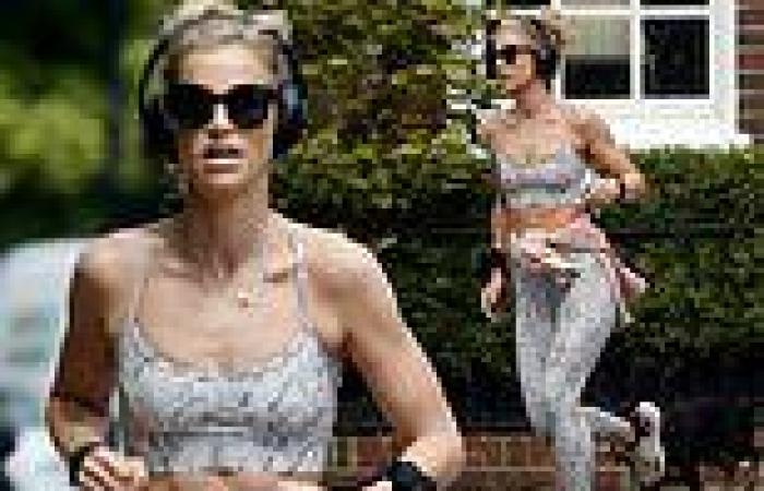 Vogue Williams flashes her toned abs in a grey crop top as she works up a sweat ...