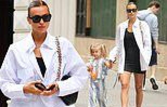 Irina Shayk looks effortless stylish in a tight black minidress while on a walk ...