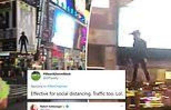 Incredible video shows man FLYING around New York's Times Square on real-life ...