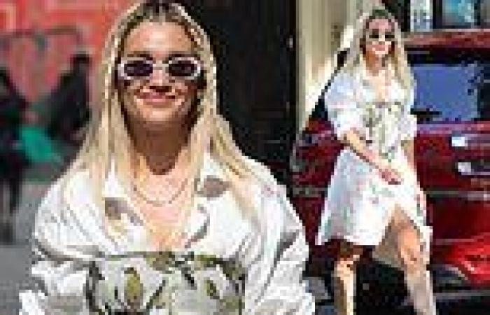 Ashley Roberts looks chic in summery white dress and flat front corset as she ...