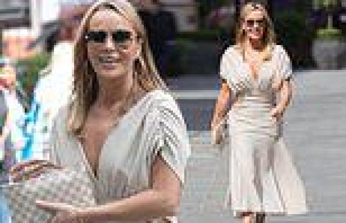 Amanda Holden highlights her svelte frame in a circle cut-out midi dress for ...