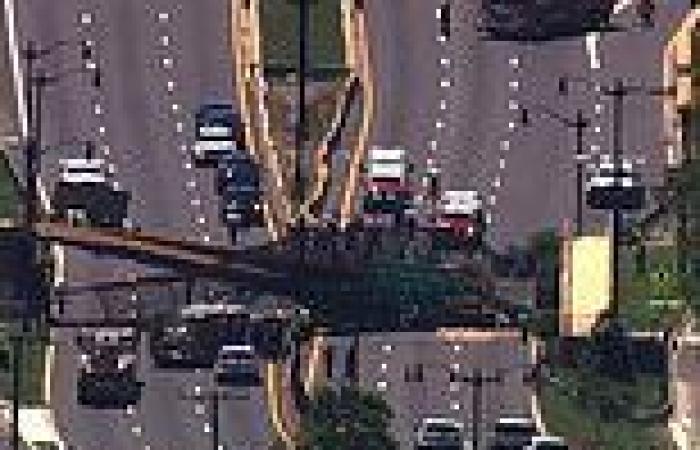 Six people injured after pedestrian bridge collapses in Washington DC