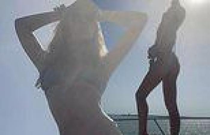 Abbey Clancy shows off her phenomenal figure in a thong bikini