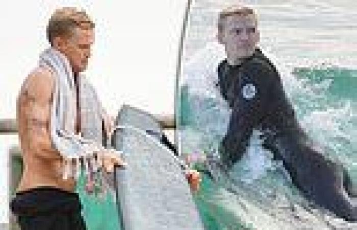 Cody Simpson shows off his ripped physique as he goes surfing on the Gold Coast 