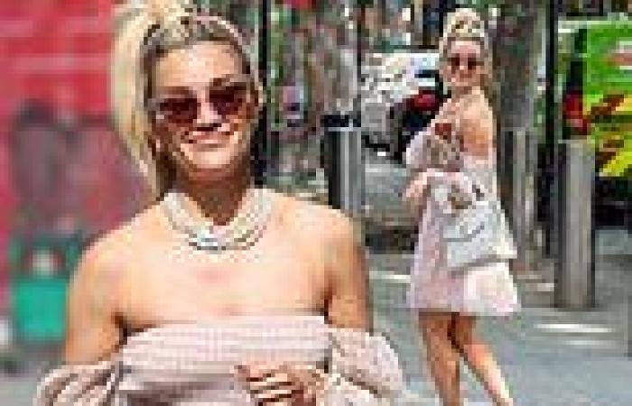 Ashley Roberts cuts a summery figure in a strapless pink checked minidress