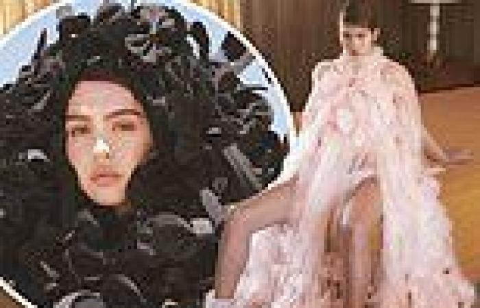 Amelia Hamlin goes avant-garde in a black gown made entirely of bow ties for ...