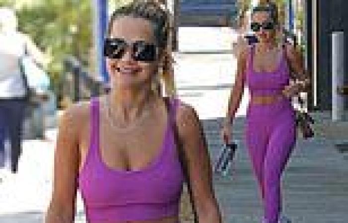 Rita Ora flashed her toned midriff as she leaves a gruelling gym session