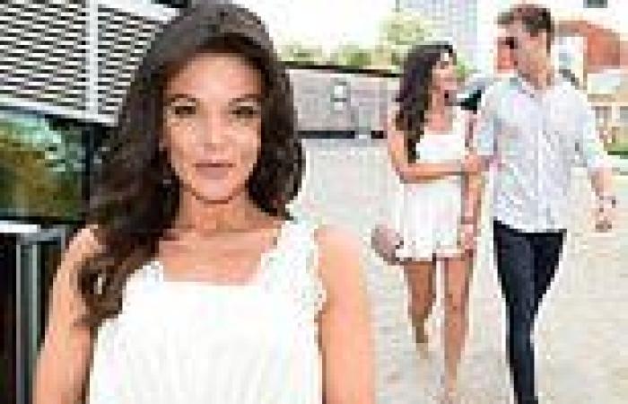 Faye Brookes shows off her bronzed legs in white playsuit