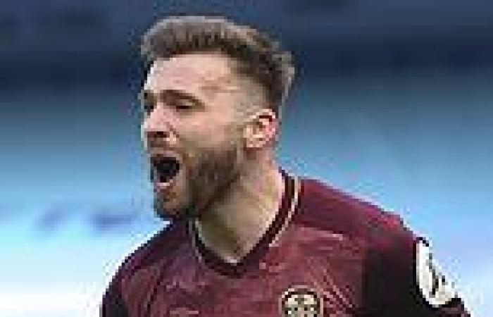 sport news Leeds United midfielder Stuart Dallas signs a new three-year contract at the ...