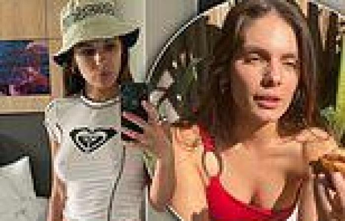 Former Neighbours star Caitlin Stasey goes braless in a tight top