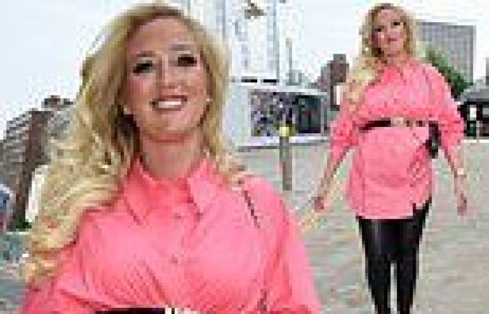 Pregnant Paris Fury highlights her growing baby bump in a belted pink shirt for ...