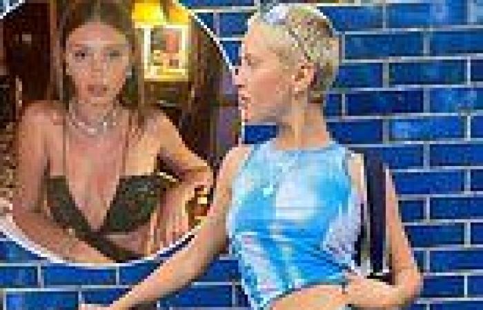 Iris Law wows in tie-dye crop top and flares as she poses for stunning shots