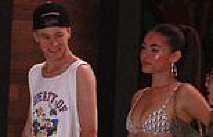 Madison Beer shows off her Dior bikini beneath khakis after performing in Las ...