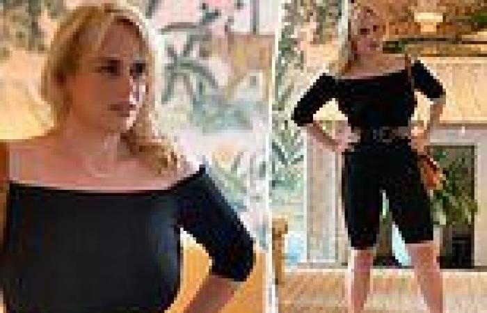 Rebel Wilson shows off her tiny waist in a Grease-inspired black bodysuit