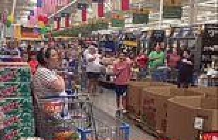 Dozens of patriotic shoppers sing Star Spangled Banner at Walmart in Texas 