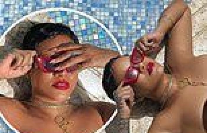 Rihanna lounges poolside in red cat eye glasses and bold lipstick for Fenty ...
