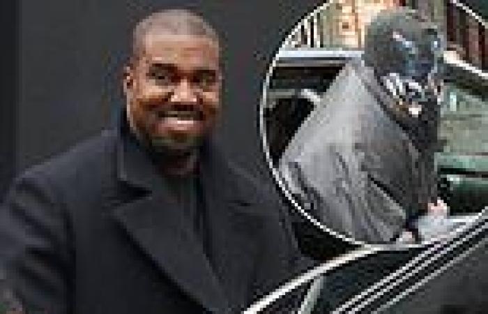 Kanye West, 44, goes undercover in black balaclava at Paris Fashion ...