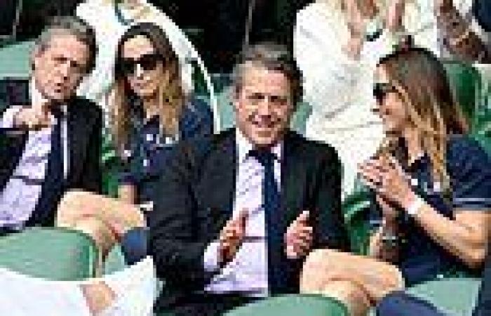 Hugh Grant, 60, shares a giggle with wife Anna Eberstein, 41, at Wimbledon