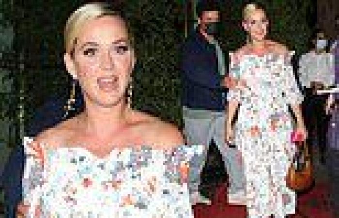 Katy Perry and fiancé Orlando Bloom exit swanky French restaurant during stay ...