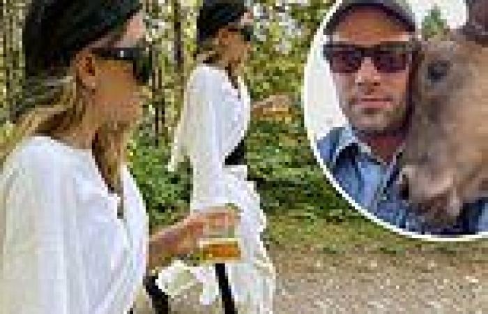 Ashley Olsen enjoys beer while wielding huge machete on nature hike with ...