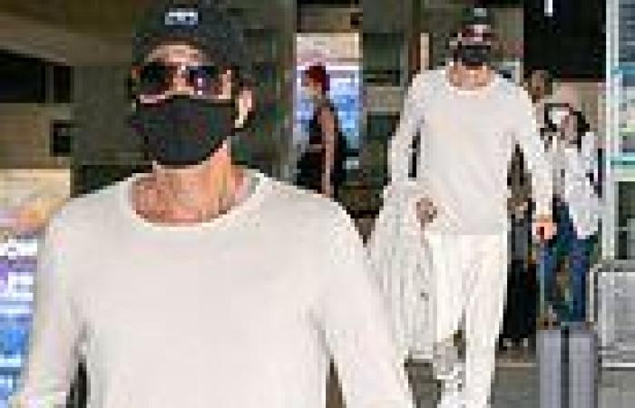 Adrien Brody opts for all-white ensemble as he touches down at Nice airport