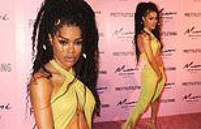 Teyana Taylor flaunts her washboard abs in a racy cut-out dress at a ...