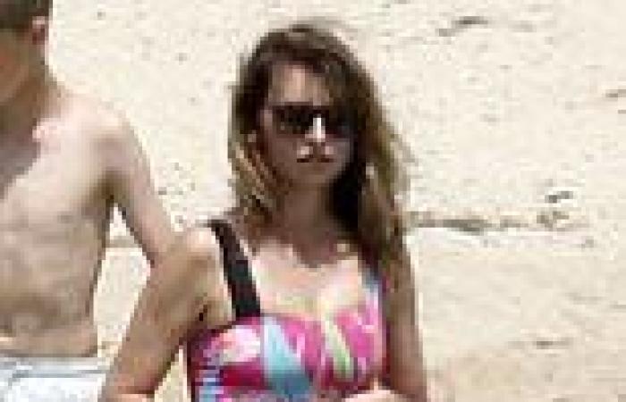 Penelope Cruz sizzles in a pink swimsuit as she continues to enjoy a family ...
