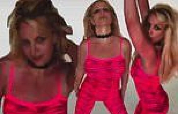 Britney Spears channels the Pink Panther in a neon pink catsuit for latest ...
