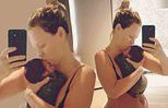 Kimberley Walsh proudly shows off her post-partum figure in black lingerie