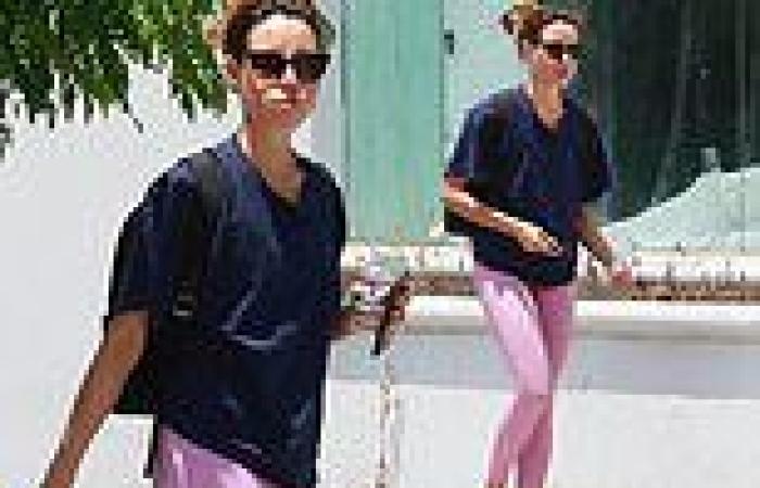 Aubrey Plaza is pretty in pink as she steps out in LA casual sporty gear