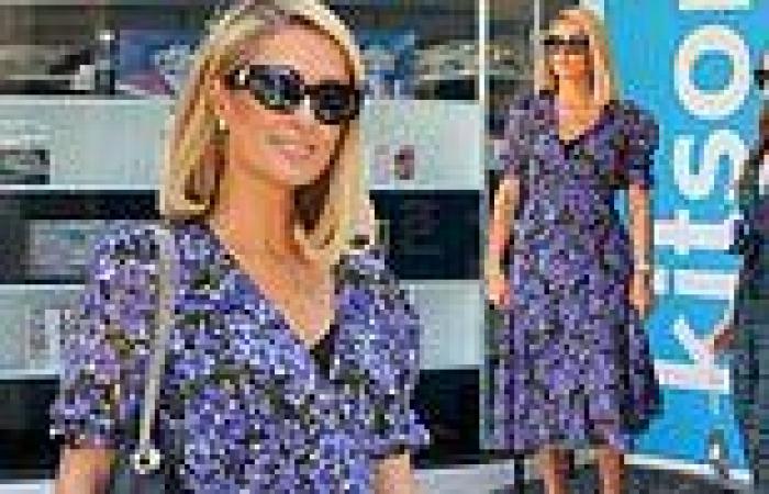 Paris Hilton rocks a blue floral dress as she enjoys a shopping spree in LA