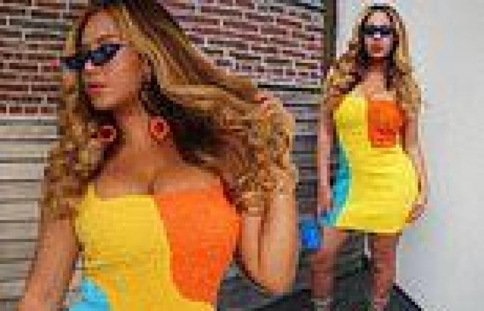 Beyonce showcases her hourglass curves in a bright colorblock mini dress with ...