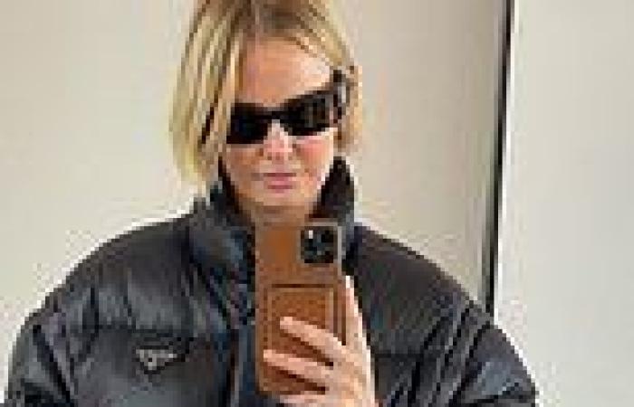 Lara Worthington wears a pricey $2200 Prada puffer jacket