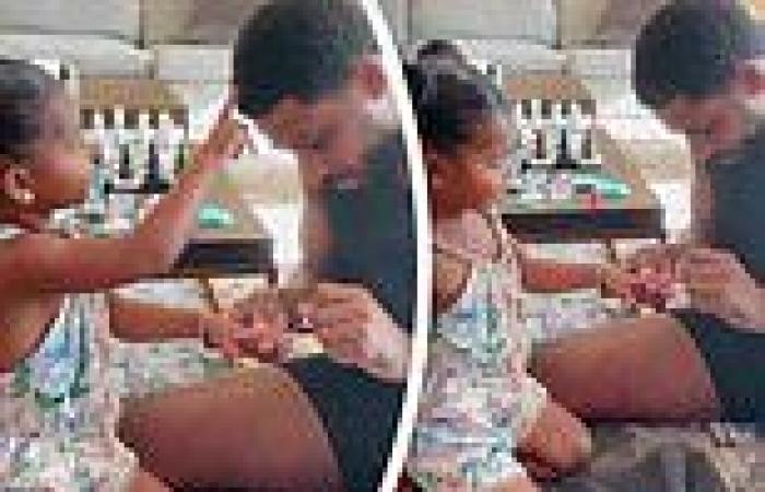 Tristan Thompson looks every inch the doting dad as he paints his ...