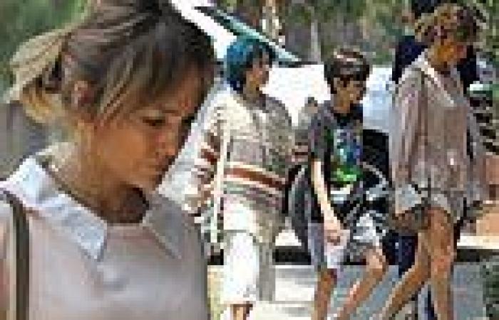 Jennifer Lopez shows off her toned legs while out with her twins Emme and Max, ...