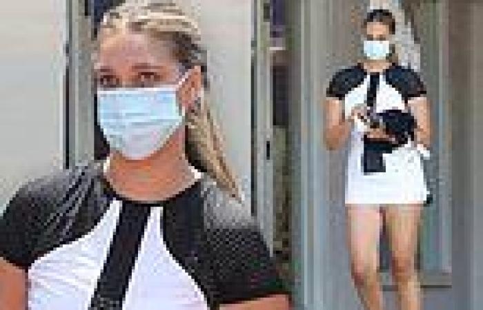 April Love Geary serves up heat wearing a chic tennis ensemble while running ...