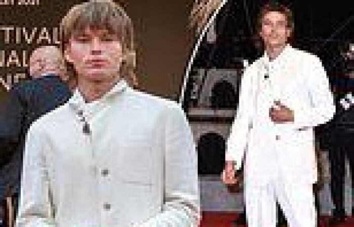 Jordan Barrett dons a quirky white suit on the Cannes Film Festival red carpet