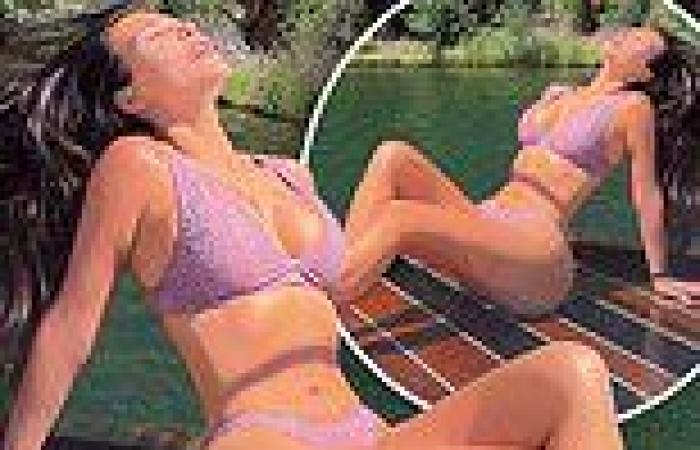 Kim Kardashian basks in the sun in a bikini as she reminds fans to 'take a ...