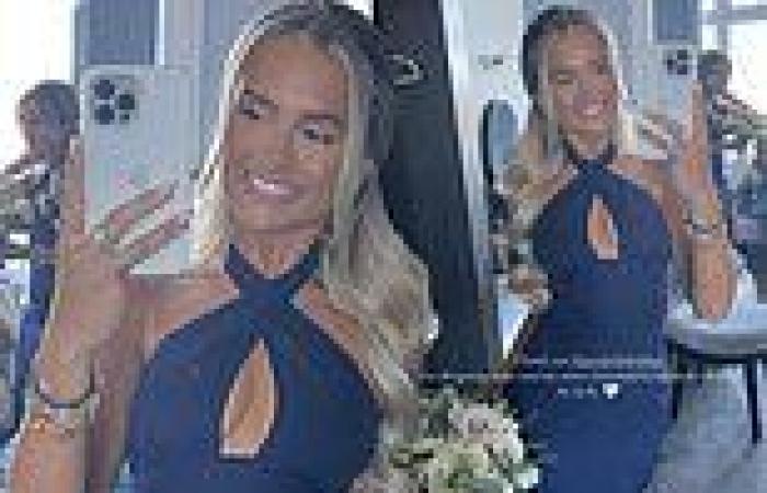 Love Island's Molly-Mae Hague looks stunning as she poses in a navy blue dress