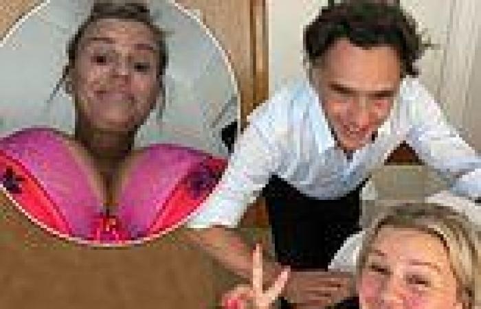 Kerry Katona shares a delighted snap with her surgeon following a breast ...