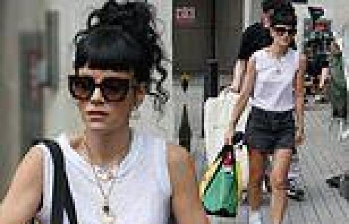 Lily Allen puts on a leggy display in tiny ripped denim shorts