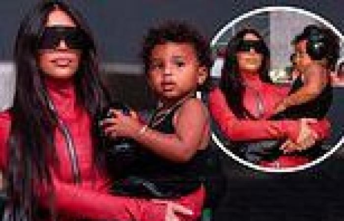 Kim Kardashian dotes on Psalm, two, who wears headphones at Kanye West's ...