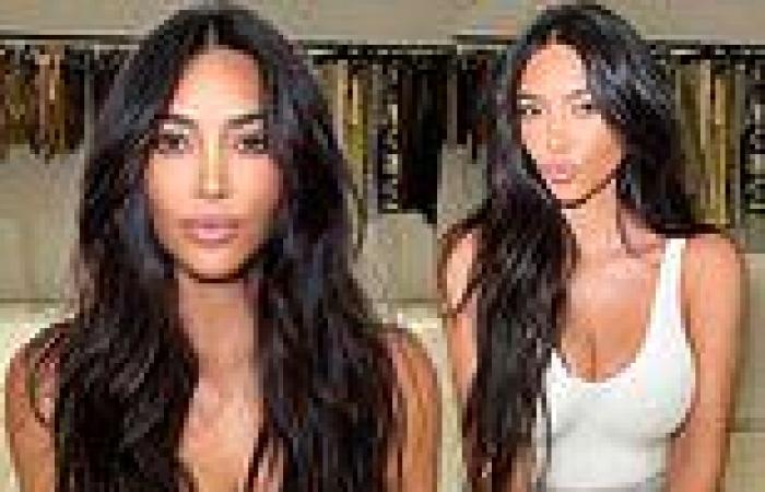 Kim Kardashian shows off her 'casual glam' as she relaxes in a white tank top ...