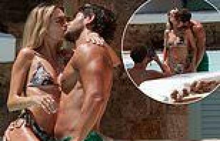 Eyal Booker and girlfriend Delilah Belle Hamlin get steamy as they smooch in a ...