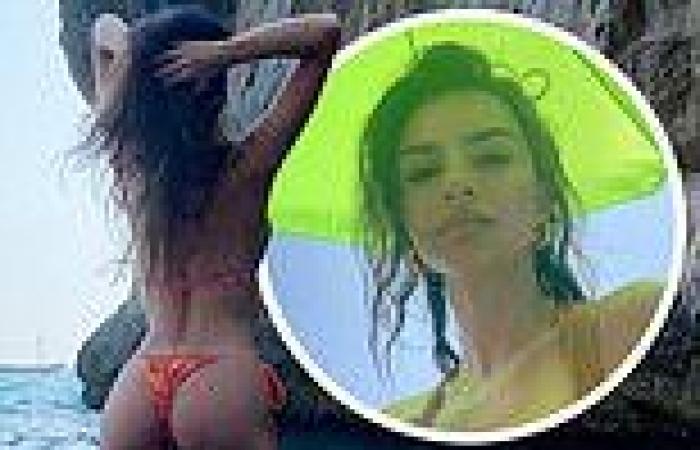 Emily Ratajkowski shows off her shapely derriere in cheeky bikini bottoms while ...
