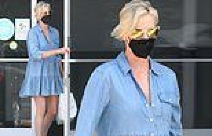 Charlize Theron is chic as she prances off from an LA dance studio in a ruffled ...