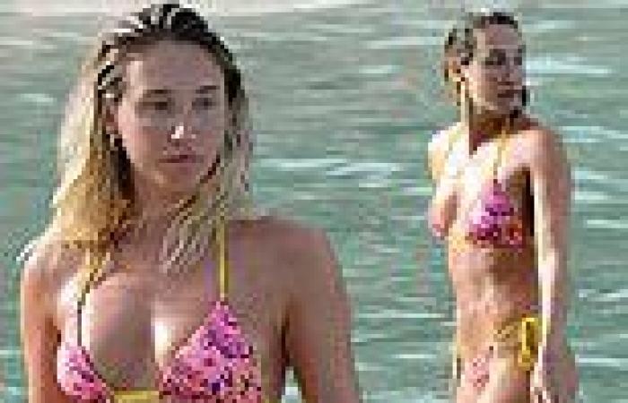 Make-up free Megan McKenna showcases her incredible figure in a skimpy pink ...