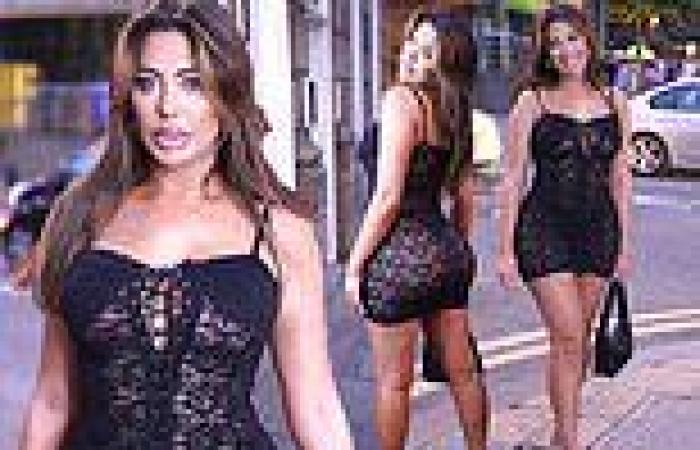 Chloe Ferry showcases her sizzling curves in a semi-sheer black lace mini
