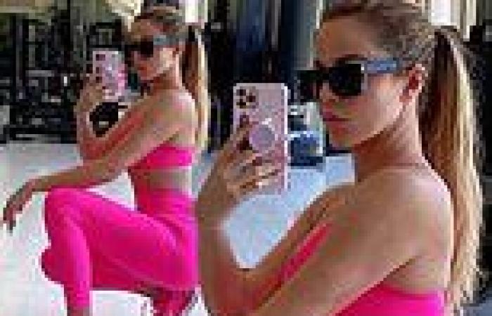 Khloe Kardashian sizzles in hot pink Good American bra and leggings